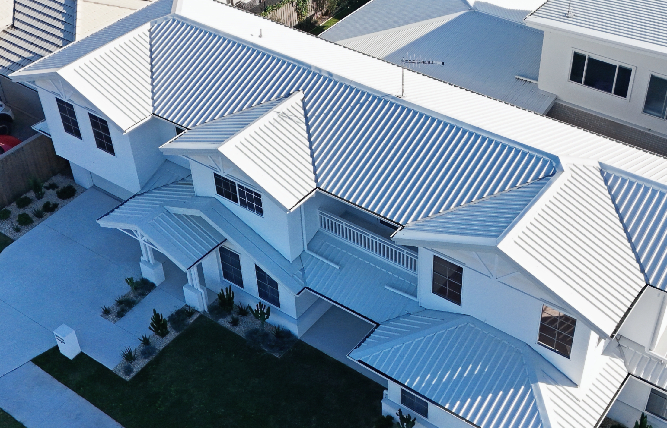 Colorbond metal roof replacement in Broadbeach Waters, Gold Coast — aerial drone view by Ascend Roofing Group